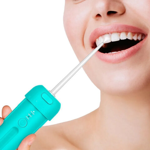 Ирригатор для полости рта KITFORT КТ-2988, портативный, емкость резервуара 0,12 л, 2 насадки, бирюзовый - фото 6