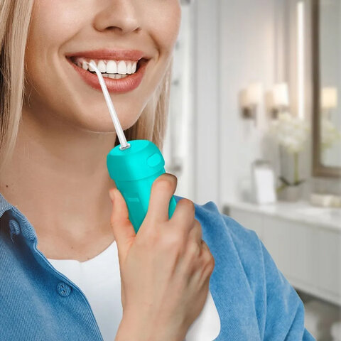 Ирригатор для полости рта KITFORT КТ-2988, портативный, емкость резервуара 0,12 л, 2 насадки, бирюзовый - фото 7